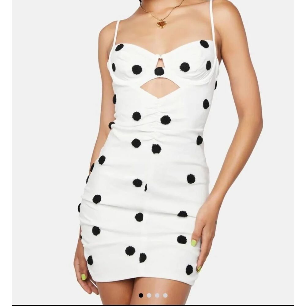 For Love & lemons Chic white dress with black polka dots.
